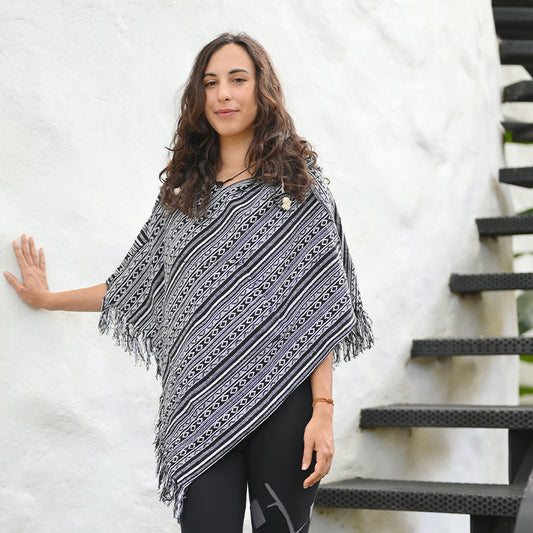 Reversible poncho Abajo